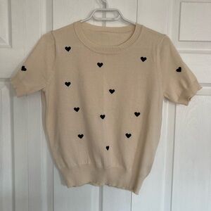 Cream Short Sleeve Sweater with Black Heart Accents